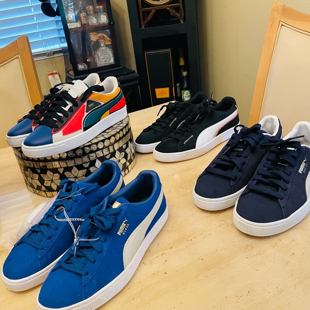 4-Pair Puma Bundle vibrant multi-colored sneakers.